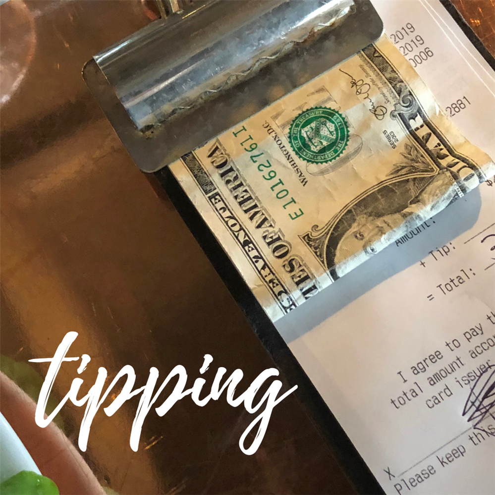  Tipping - a photo with a receipt and tip